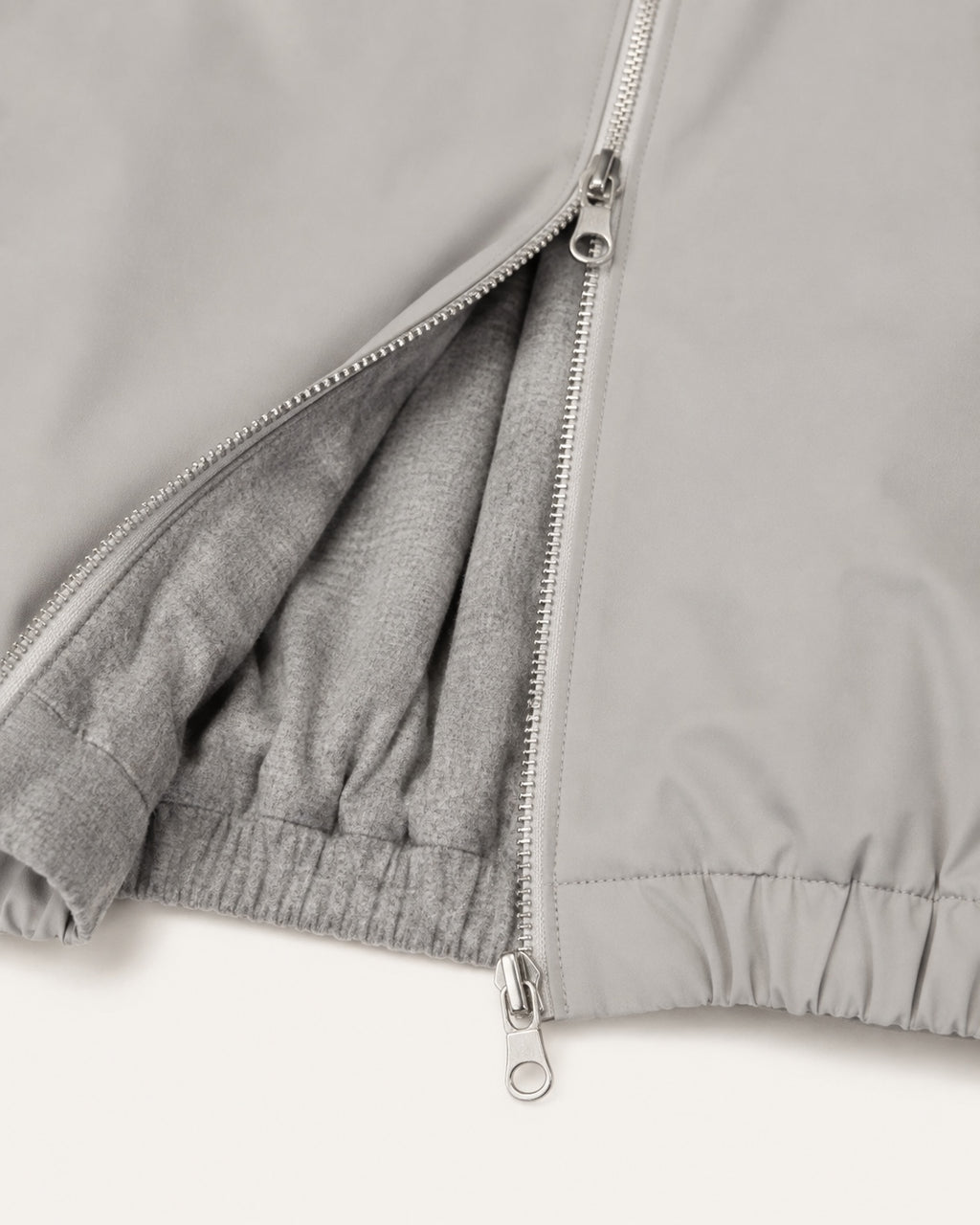 Two-way zip and reversible construction detail